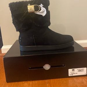 G by Guess Addalyn faux fur & suede black boots with gold buckle.